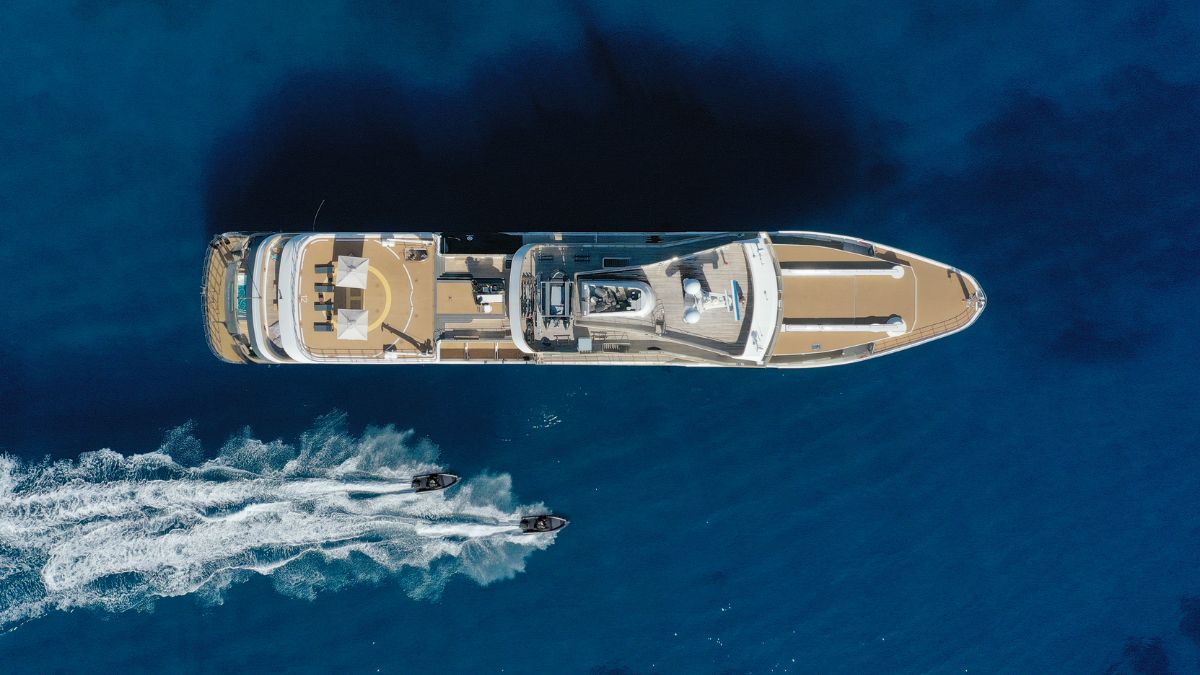AQUA LARES, a large luxury yacht and former LEGEND, known for its impressive length and sophisticated design.