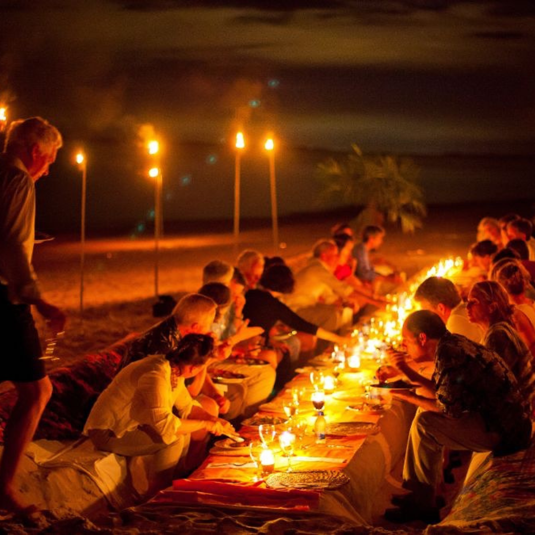 family BBQ beach candle light
