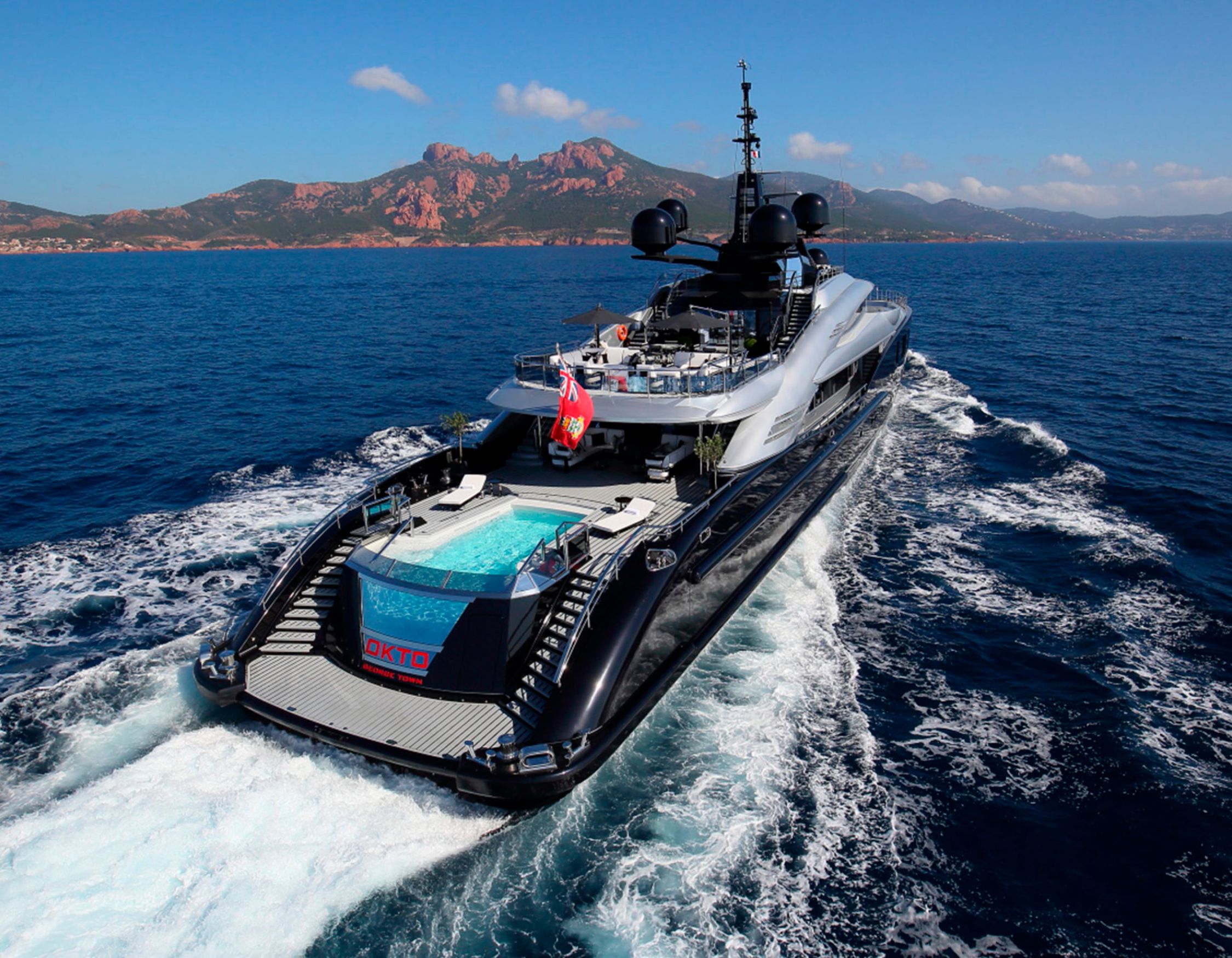 OKTO superyacht luxury yachting with a pool aboard