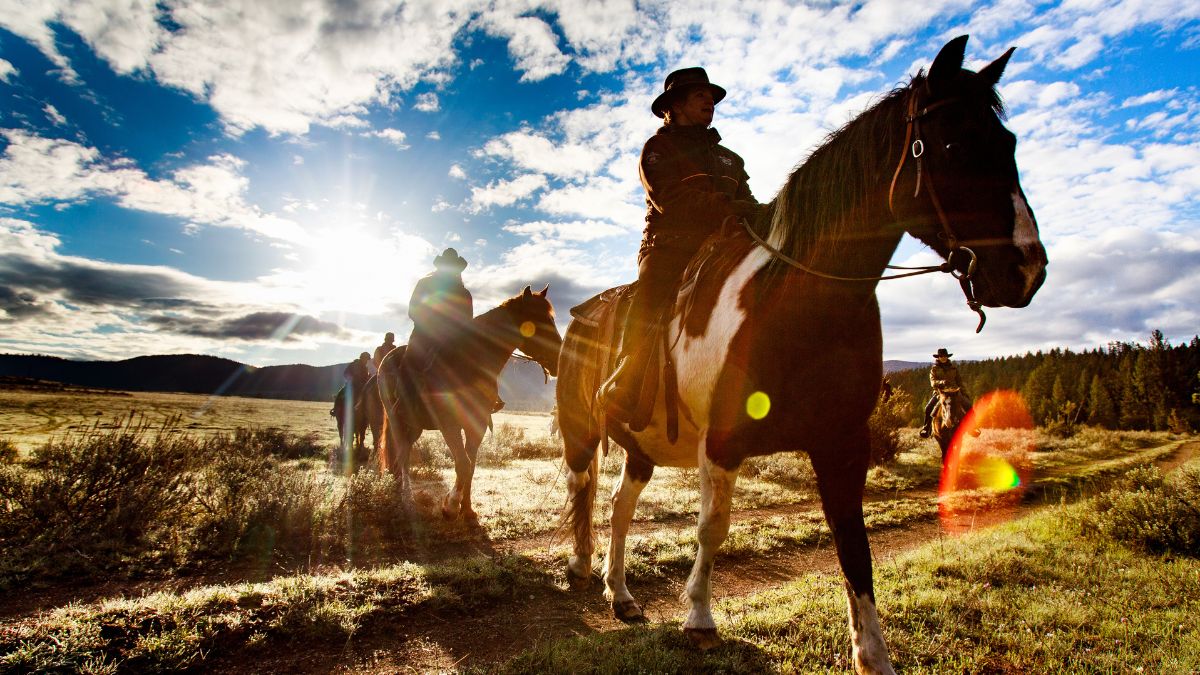 2 riders on horseback in montana