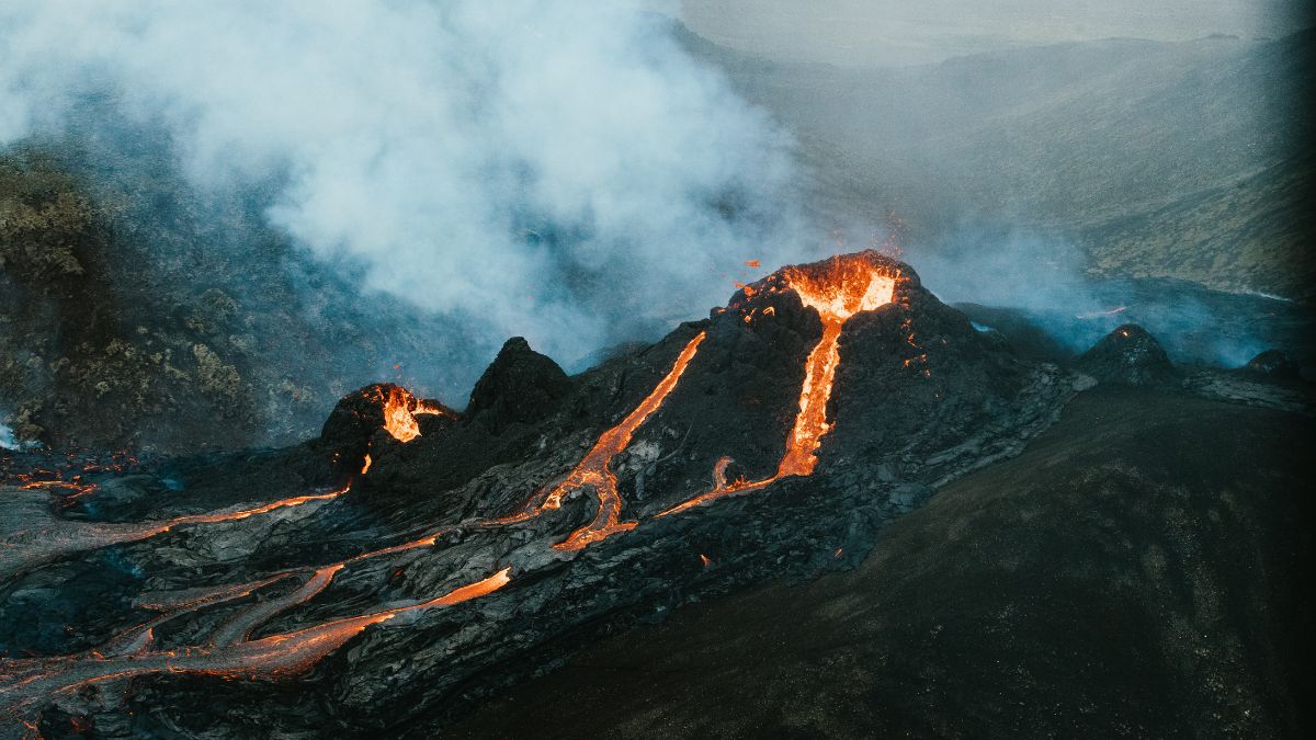 Lava and smoke from an erupting Icelandic volcano.