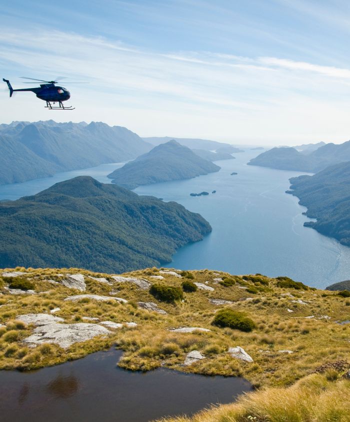 helicopter over New Zealand lake