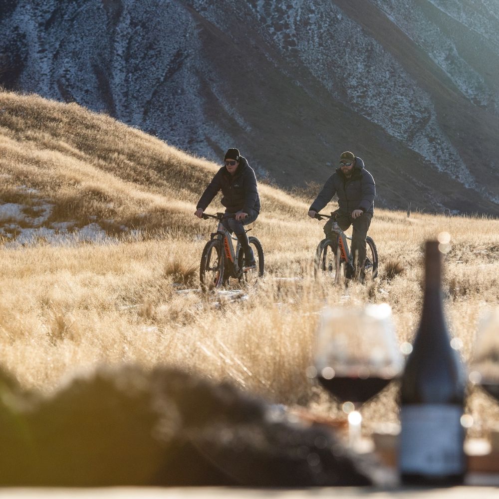 two people cycling