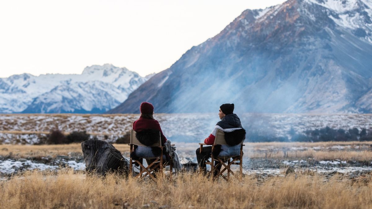two people sitting outside