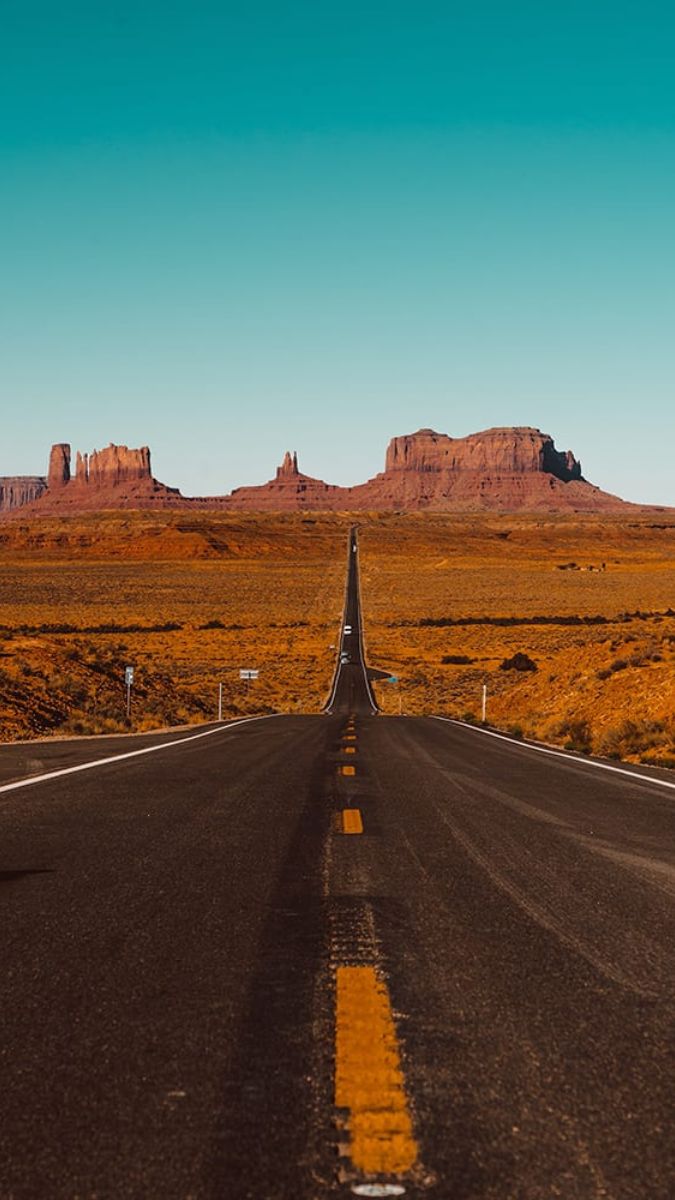 Scenic highway through Monument Valley, a classic stretch on a Utah road trip
