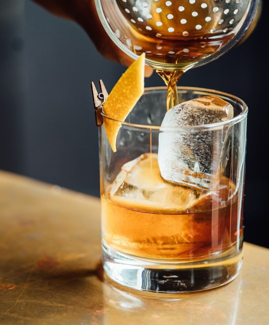 whisky cocktail with orange twist