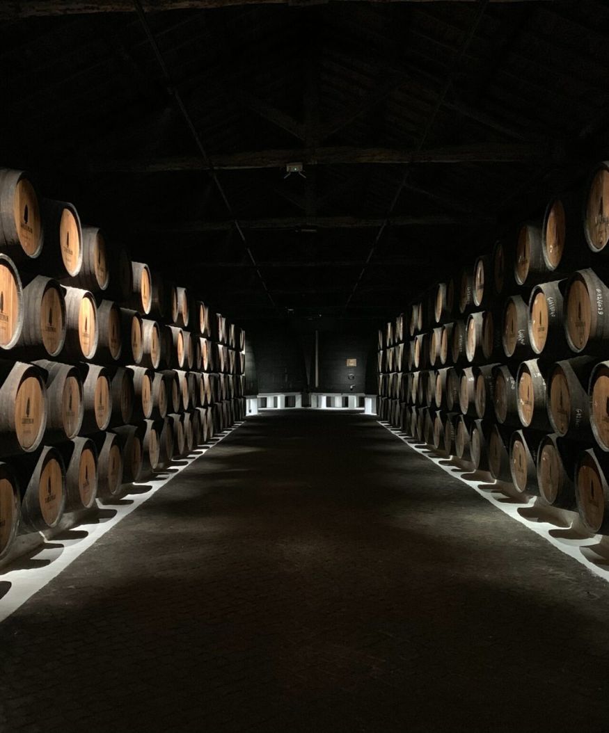 Barrels in dark corridor