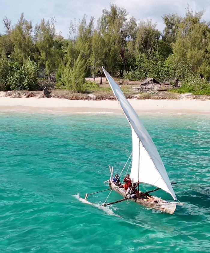 two men on a sail boat